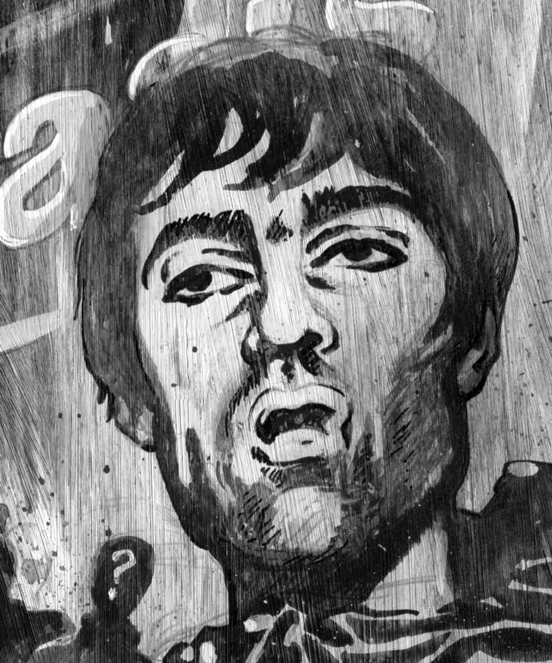 detail of newspaper illustration of oasis: liam gallagher